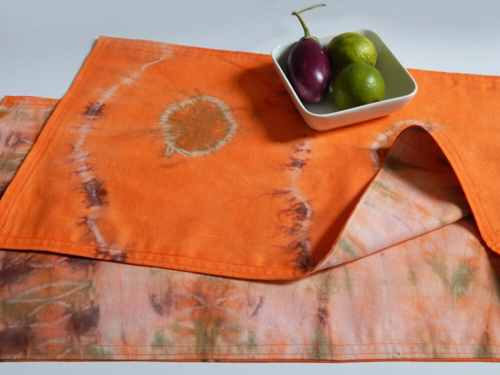 orange shibori table runner